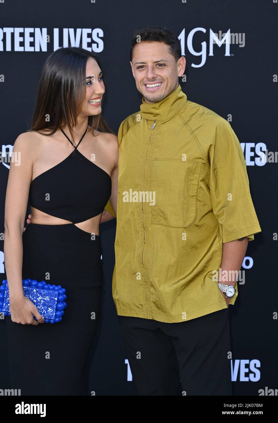Los Angeles, USA. 28th July, 2022. LOS ANGELES, USA. July 28, 2022: Nicole McPherson & Javier Chicharito Hernandez at the premiere for 'Thirteen Lives' at the Regency Village Theatre, Westwood. Picture Credit: Paul Smith/Alamy Live News Stock Photo