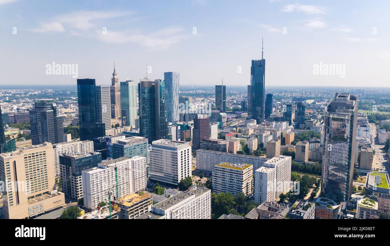 7.22.2022 Warsaw, Poland. Summertime in Warsaw. Skyline perspective of neomodern skylines - the highest Varso - and social realism representative - Palace of Culture and Science. High quality photo Stock Photo