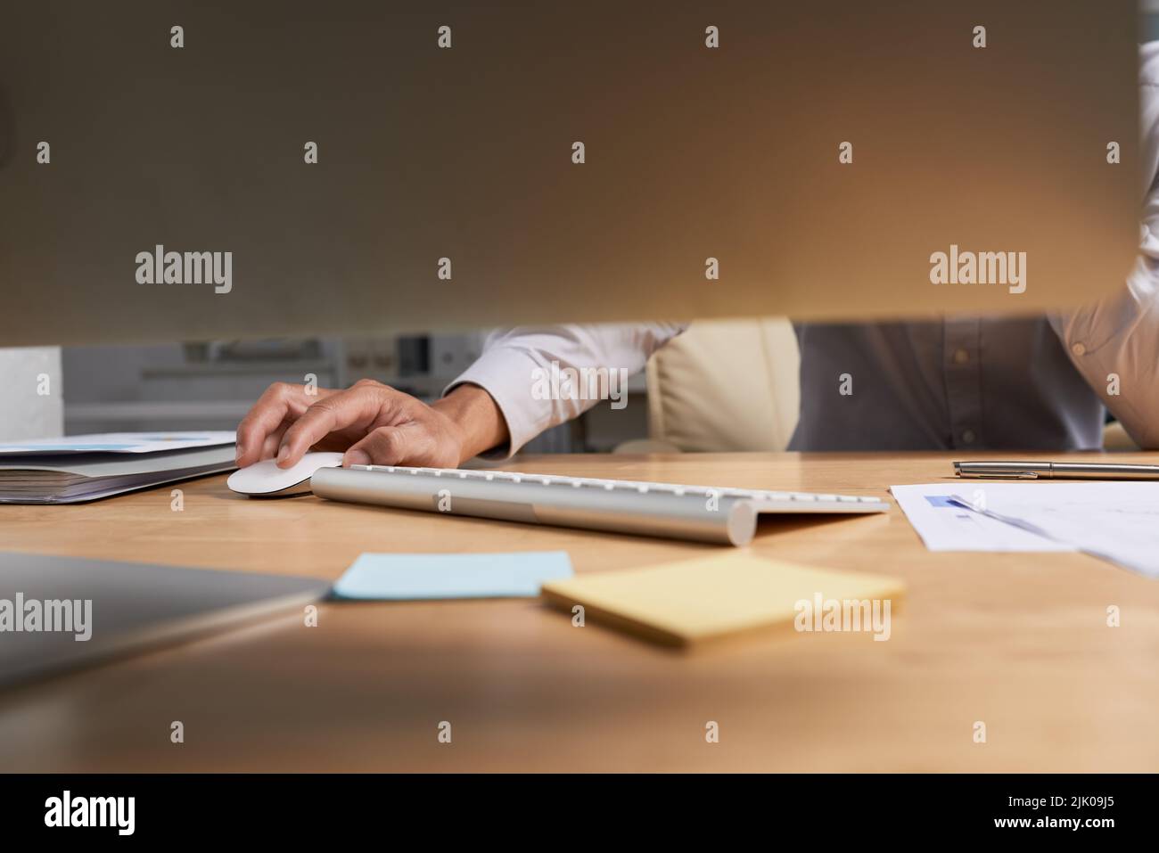Businessman working on computer in his office, selective focus Stock Photo