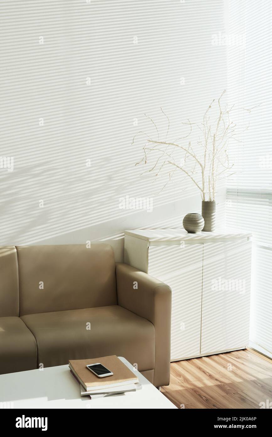 Empty light living room with sofa and big window Stock Photo