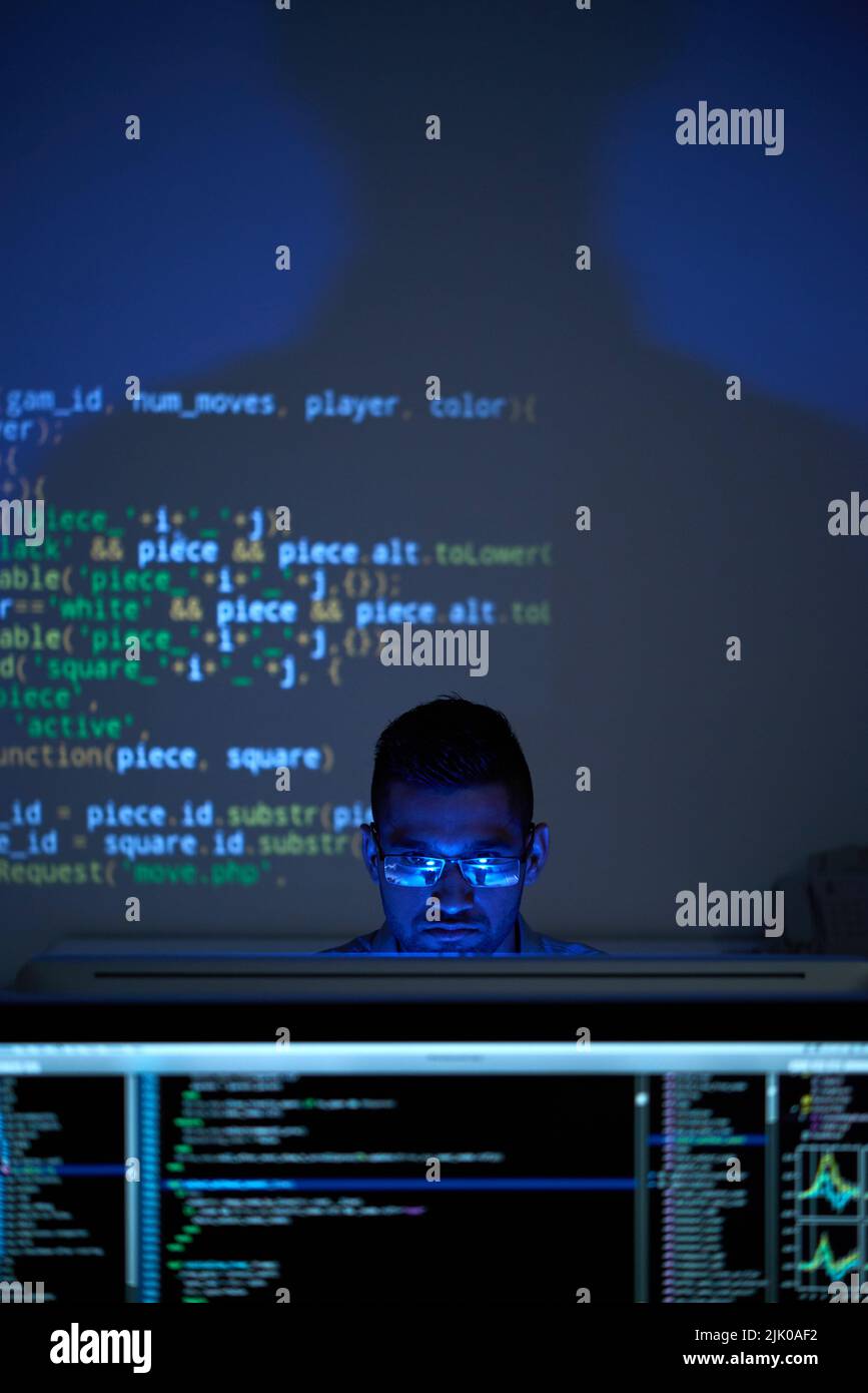 Young Indian It specialist busy with work on new project Stock Photo