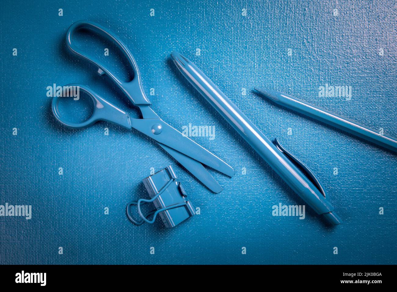Stationery on a blue background. Office and learning concept Stock ...