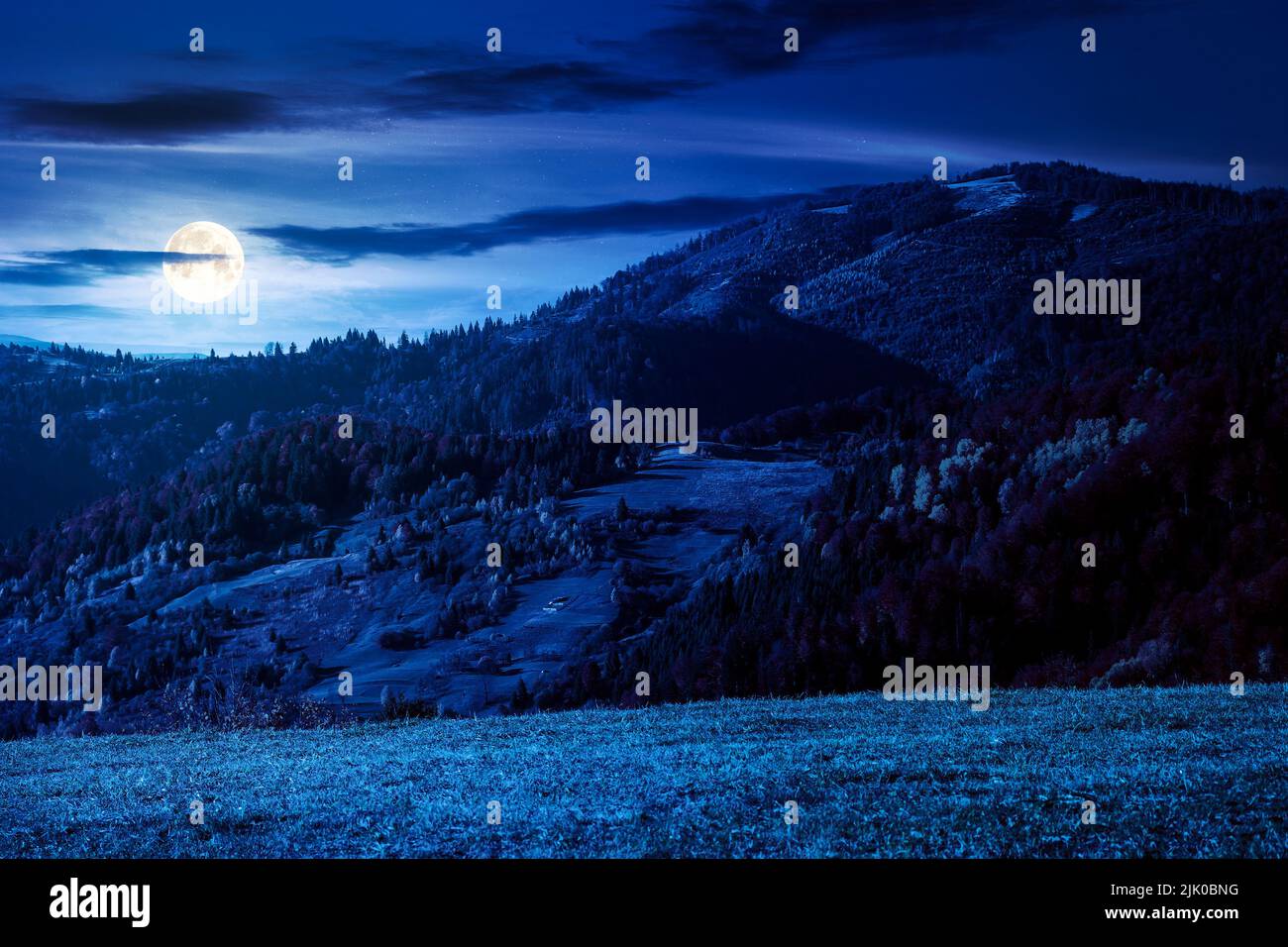 Moon Light Countryside mountain landscape in autumn at night. wonderful countryside with trees ...