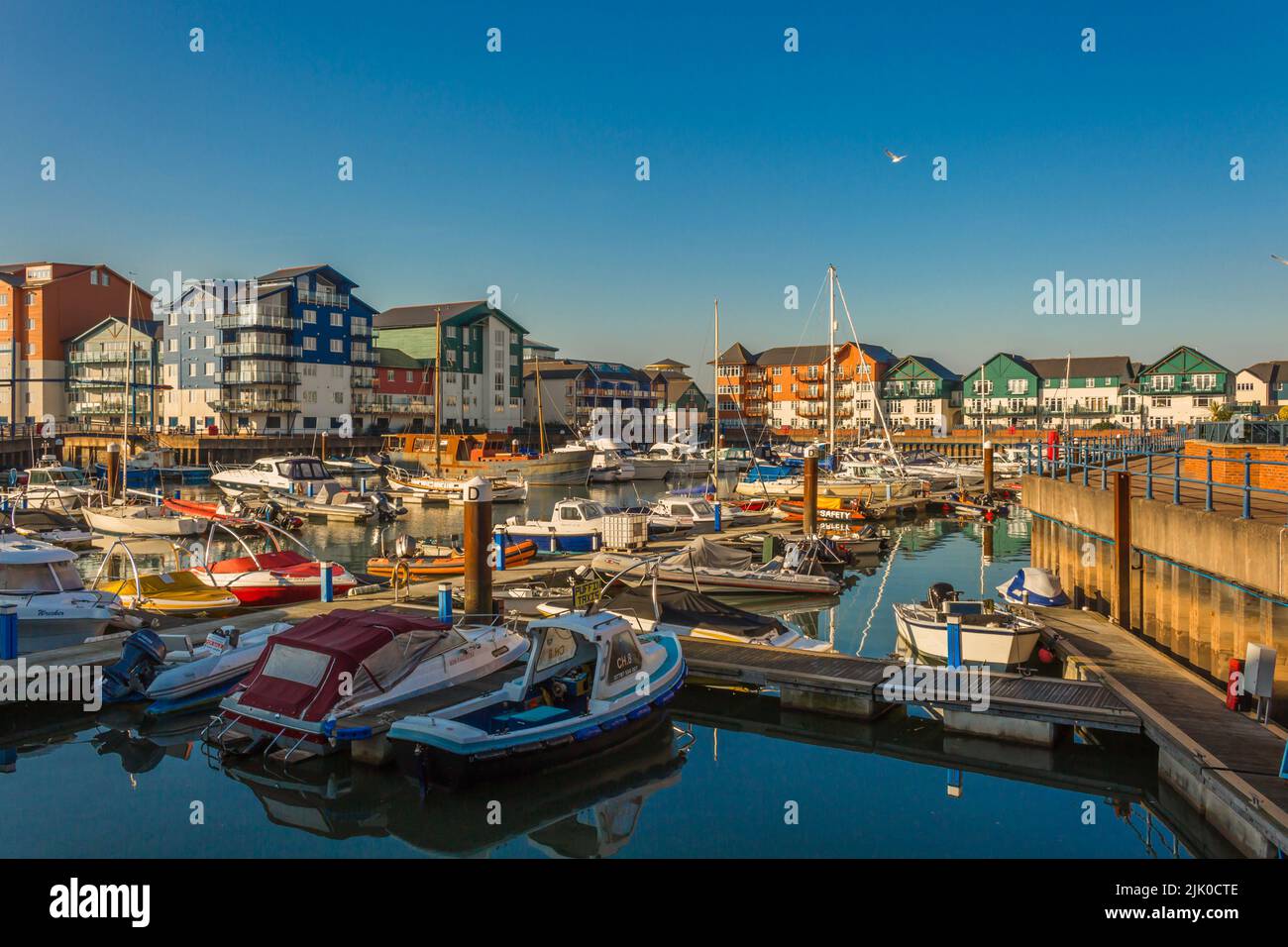 Exmouth marina in the county of Devon, United Kingdom  surrounded by colourful appartment buildings Stock Photo