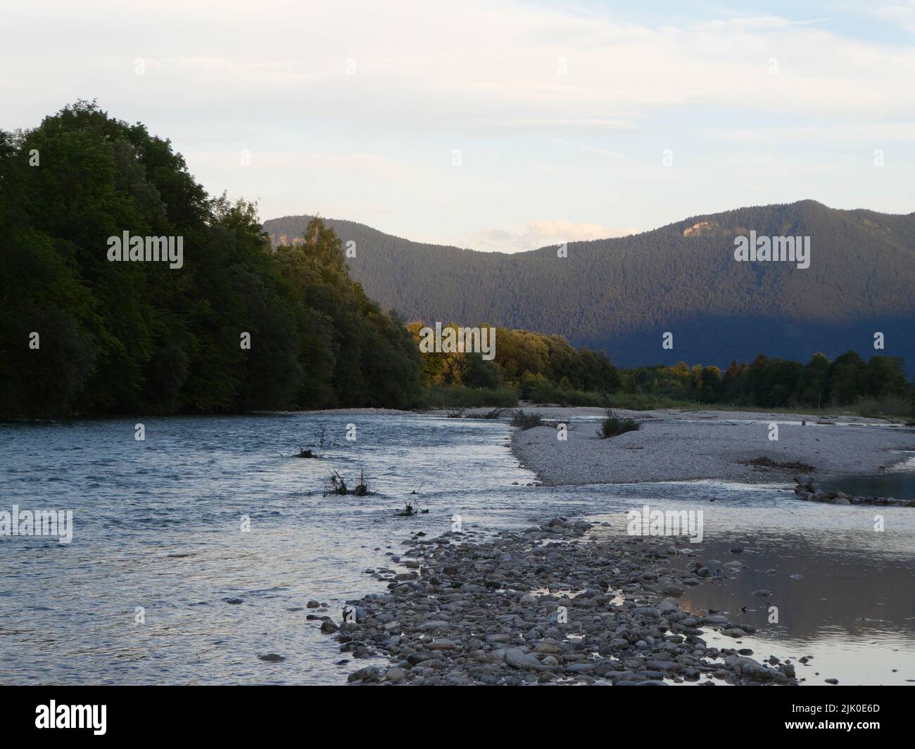 Scenic riverbed of Isar near Lenggries in evening light Stock Photo