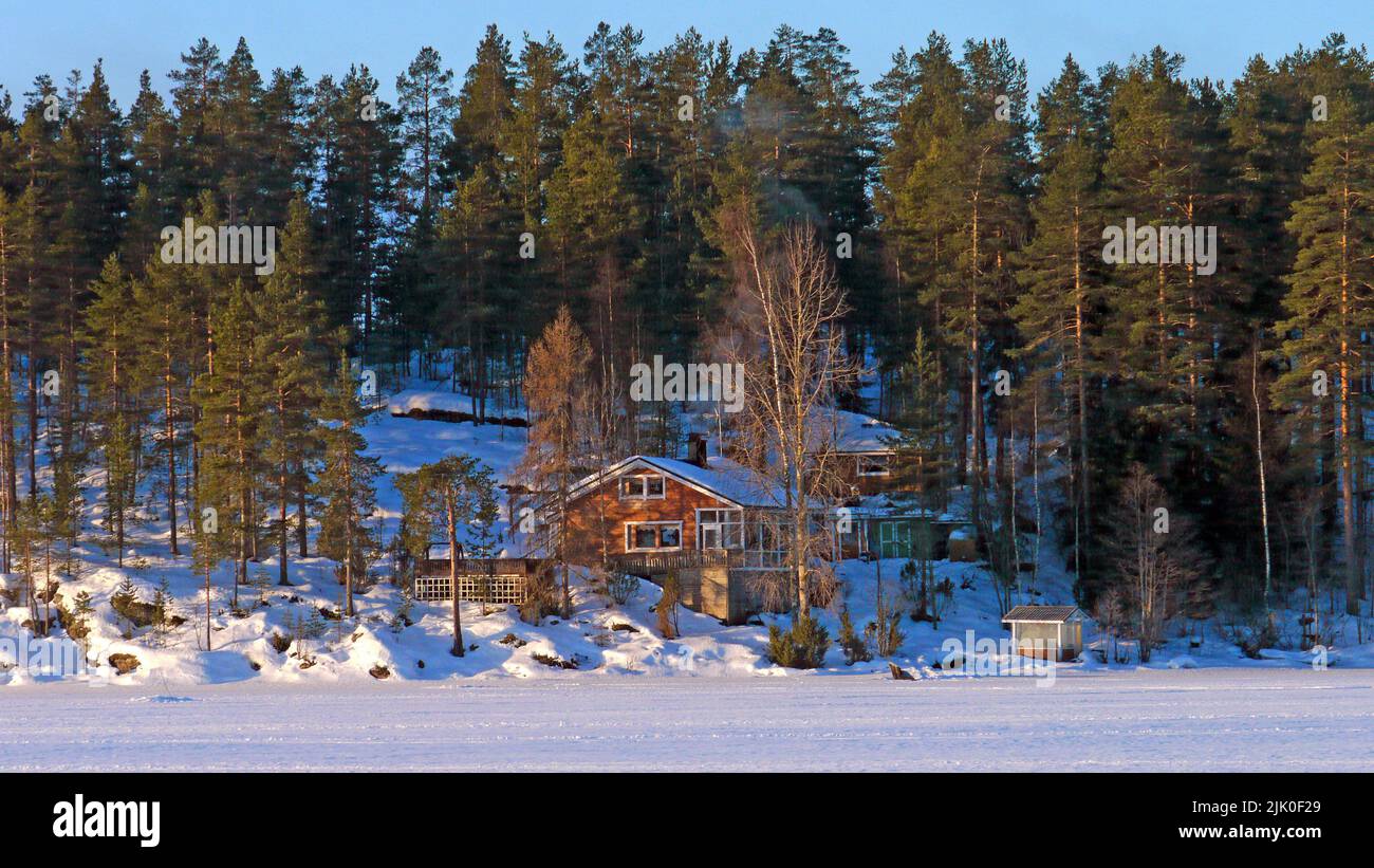 A waterfront house in Rautoniemi, Kuopio, Finland, 2017-03-12 07:19 +02. Stock Photo