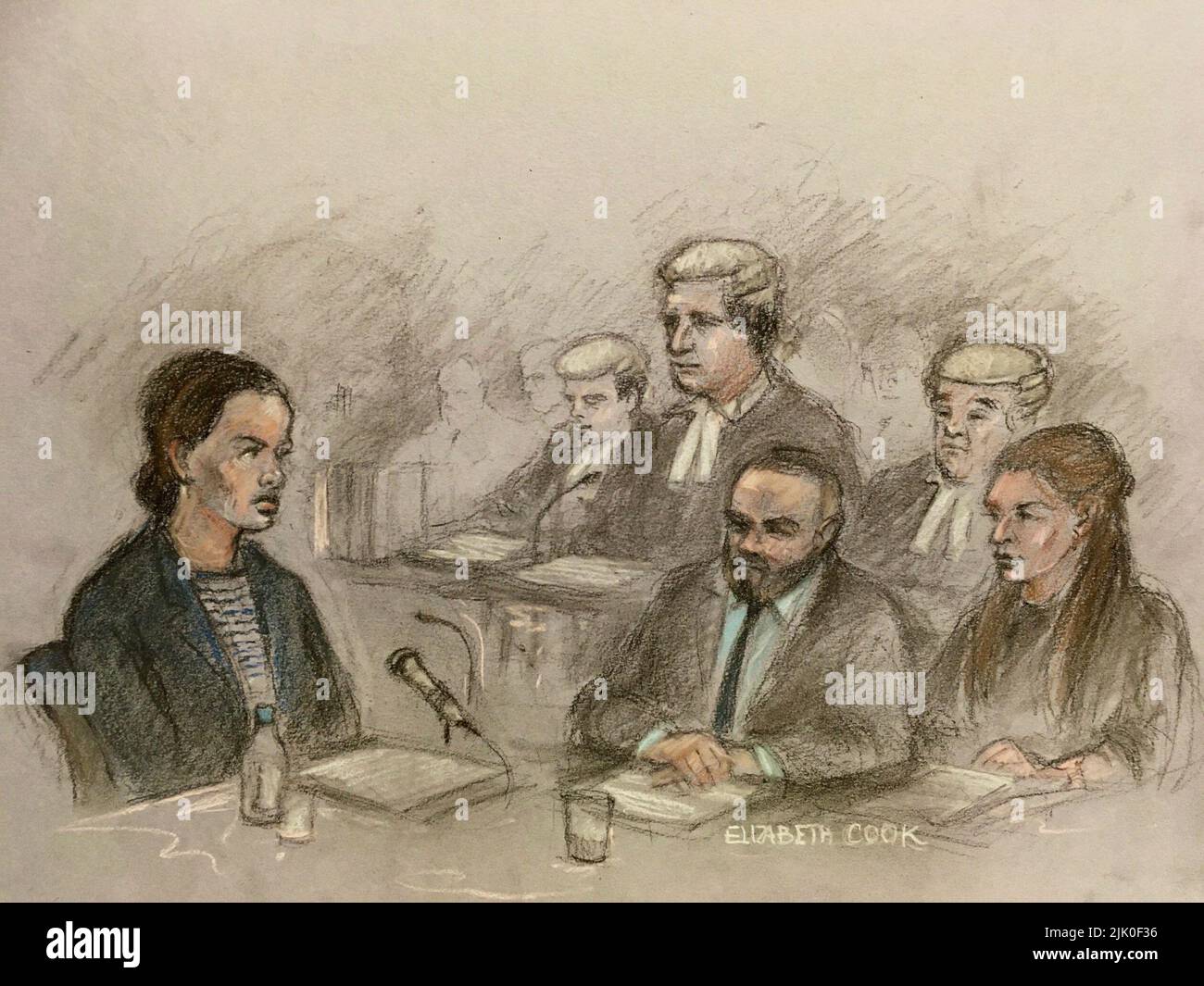 File photo dated 12/5/2022 of vourt artist sketch by Elizabeth Cook of Coleen Rooney's barrister David Sherborne (centre back) questioning Rebekah Vardy (left) as she gives evidence at the Royal Courts Of Justice, London, as Coleen (right) and Wayne (second right) Rooney watch. Rebekah Vardy and Coleen Rooney are due to find out who has won their High Court libel battle in the "Wagatha Christie" case. In a viral social media post in October 2019, Mrs Rooney, 36, said she had carried out a "sting operation" and accused Mrs Vardy, 40, of leaking "false stories" about her private life to the pres Stock Photo