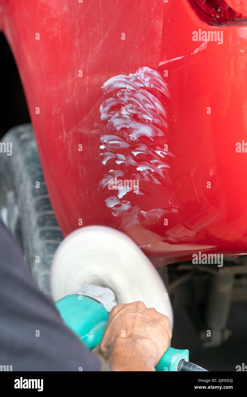 Closeup body repair tool for removing scratches, removing uneven paint and polishing cars Stock