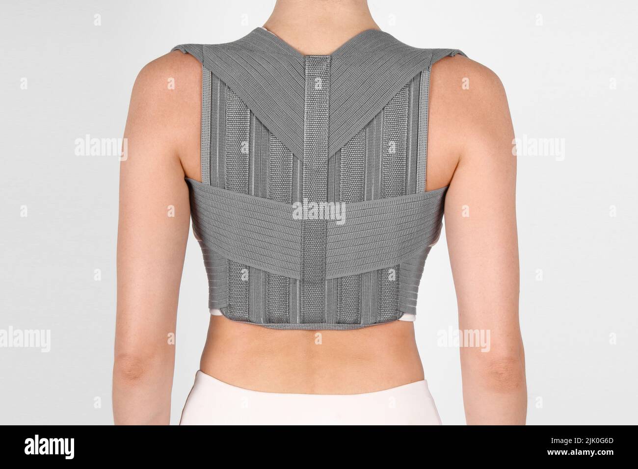 Posture Corrector isolated on white. Orthopedic lumbar support products. Lumbar Support Belts For Back Clavicle Spine. Lumbar Waist Support Belt Stock Photo