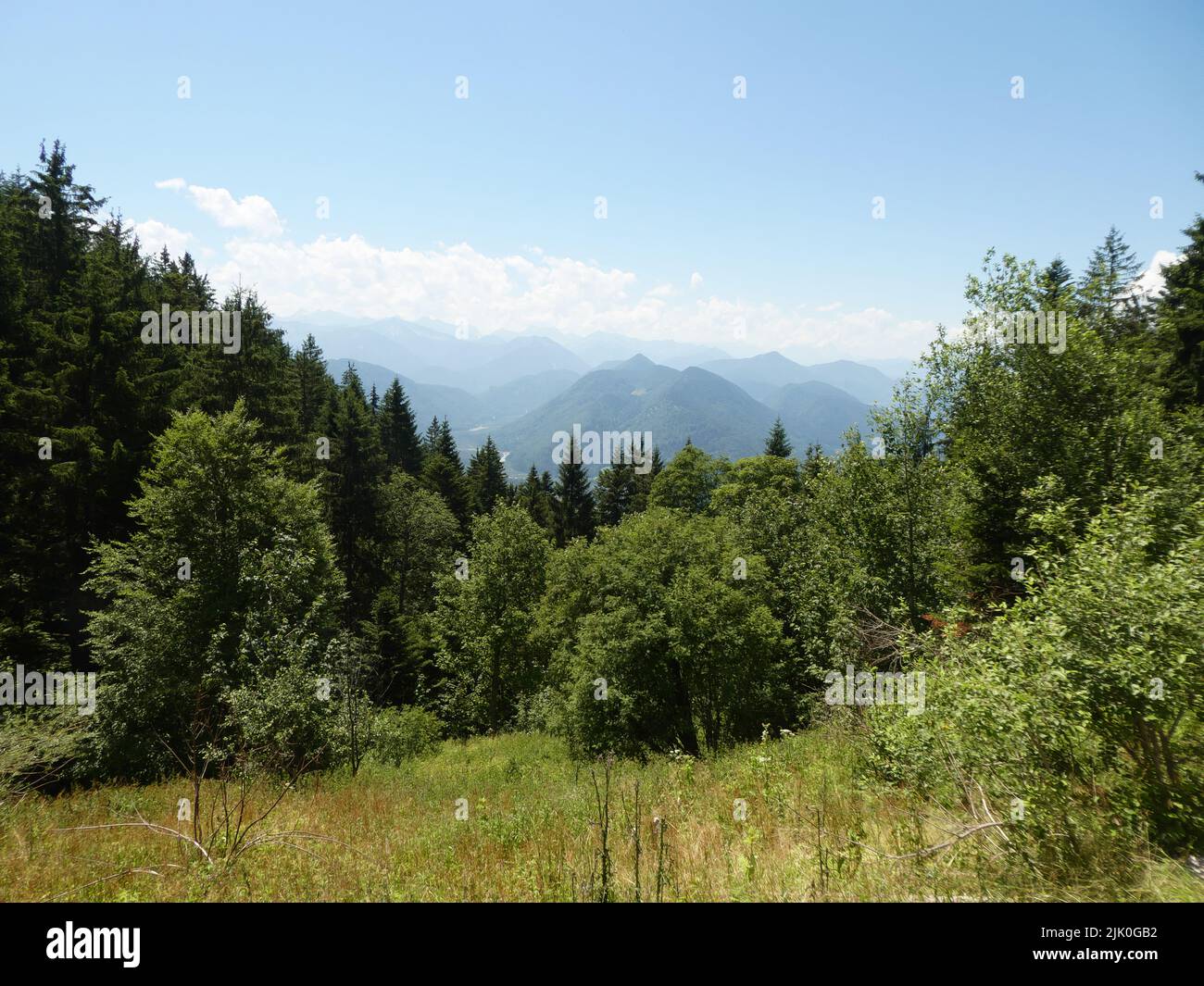 Scenic view from Lenggrieser Hütte with background of mountains Stock Photo