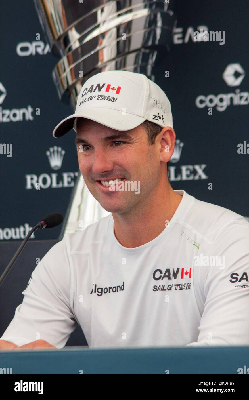 SailGP, Plymouth, UK. 29th July, 2022. Phil Robertson, Driver Team Canada. Friday is practice day for the Great British Sail Grand Prix, as Britain's Ocean City hosts the third event of Season 3 as the most competitive racing on water. The event returns to Plymouth on 30-31 July. Credit: Julian Kemp/Alamy Live News Stock Photo