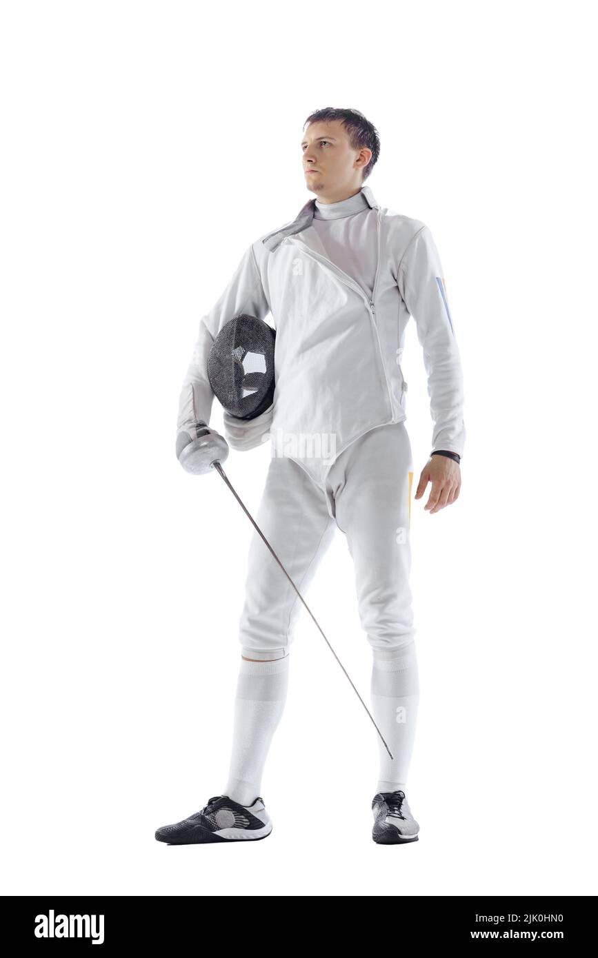 Portrait of professional male fencer in fencing costume and mask