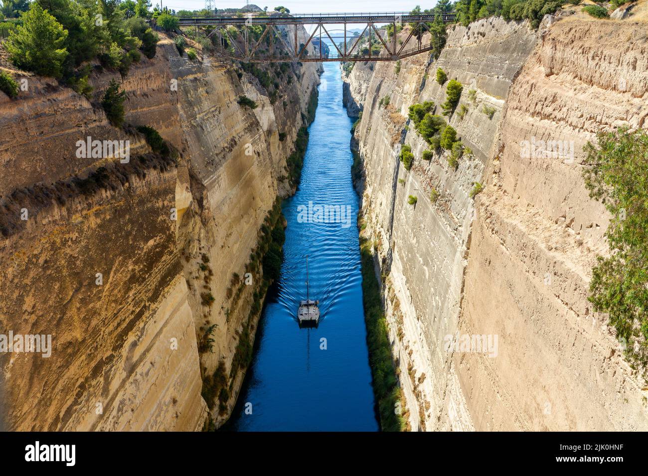 Corinth, Greece, July 16, 2022. The Corinth Canal is an artificial waterway carved through the Isthmus of Corinth, Greece Stock Photo