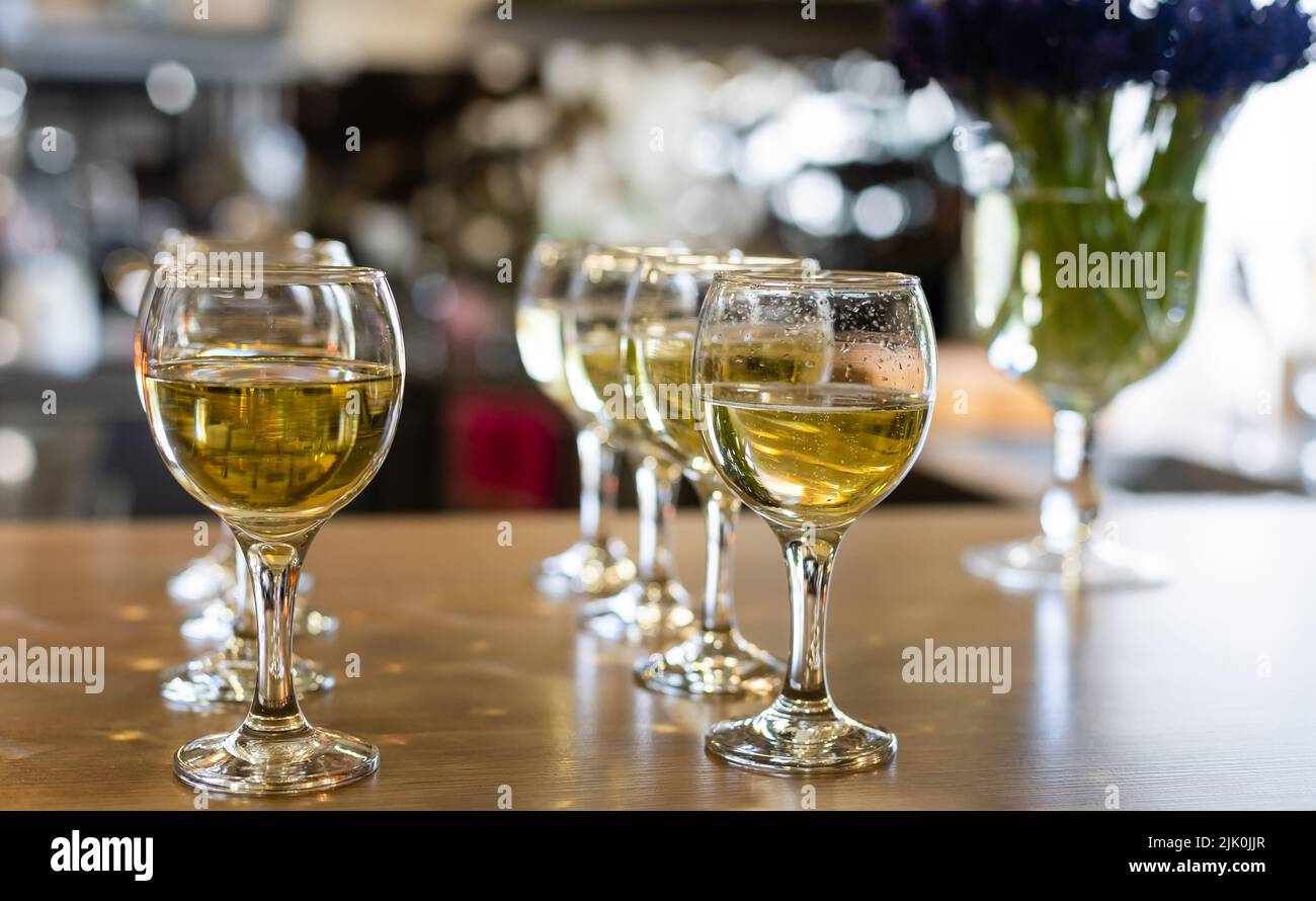 Many glasses of different wine in a row on bar counter Stock Photo Alamy