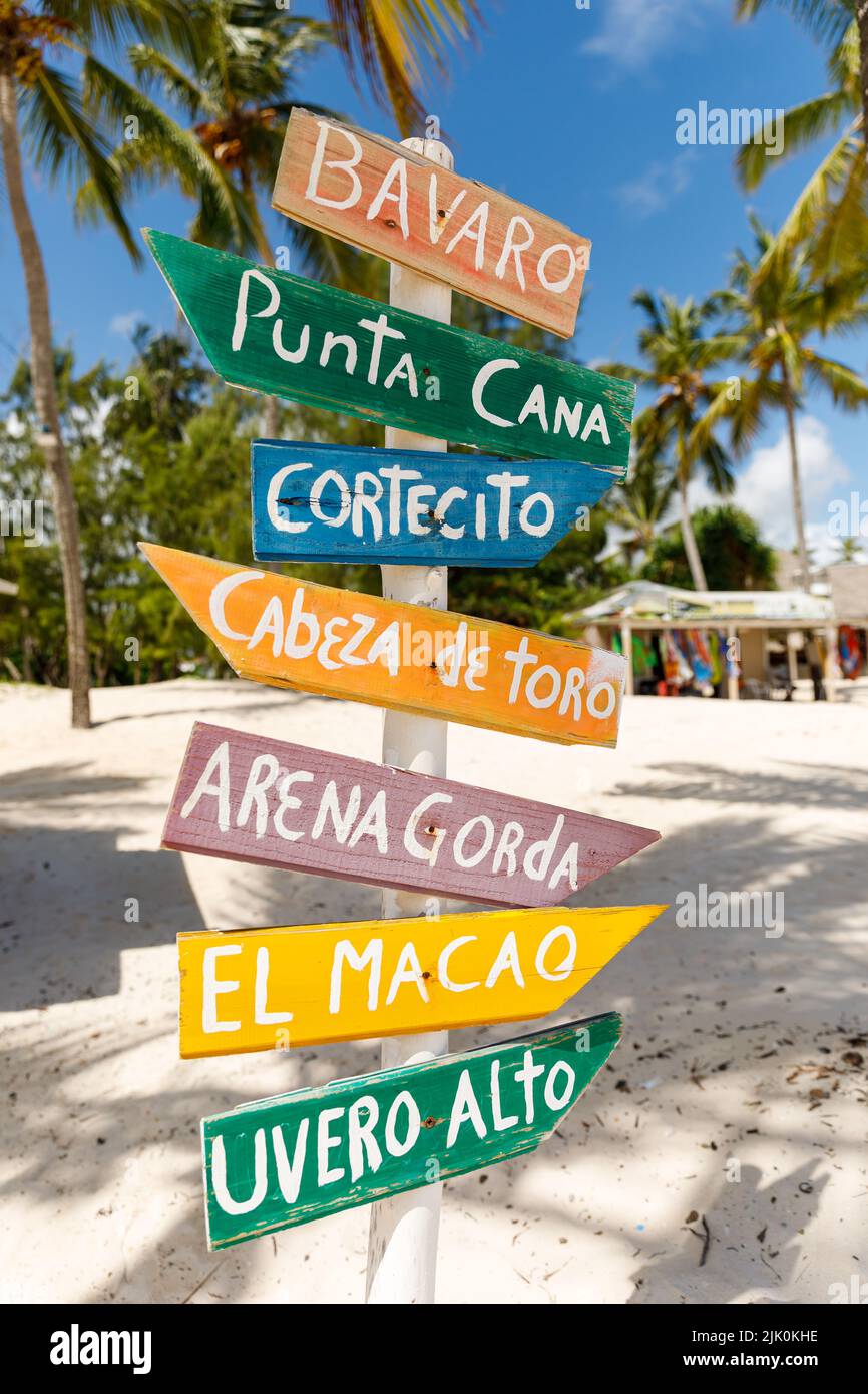 07.24.2022. Dominican Republic Bavaro Punta cana provinces La Altagracia. Wooden pillar with signposts directions Stock Photo
