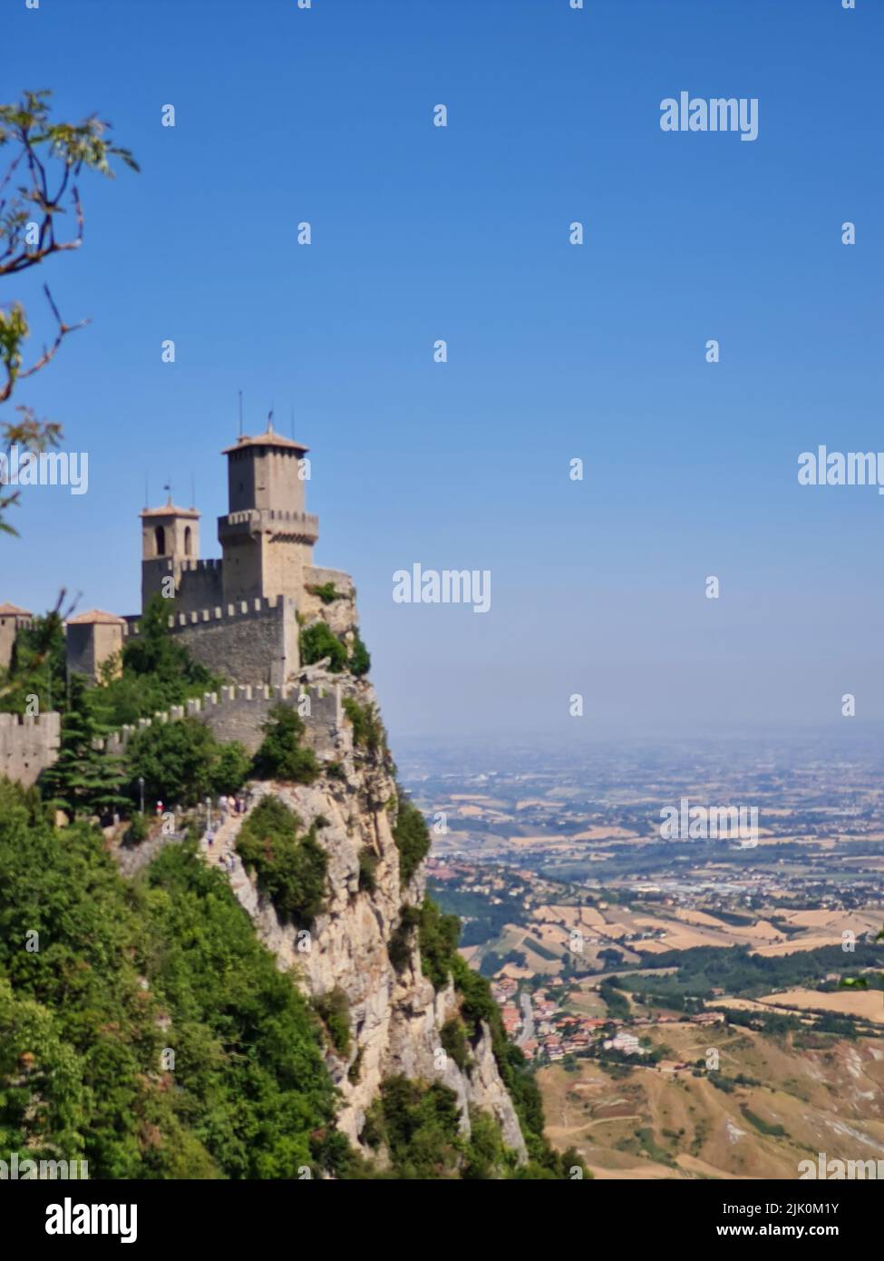 the-ancient-fortress-of-san-marino-against-the-blue-sky-stock-photo-alamy