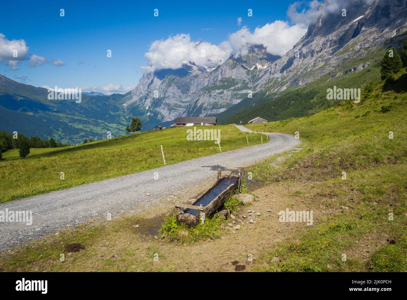 Hiling to Wengen from Kleine Scheidegg in the Berneses Oberland of Switzerland Stock Photo