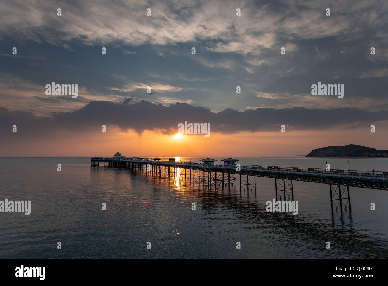 Llandudno pier at sunrise on the north Wales coast Stock Photo