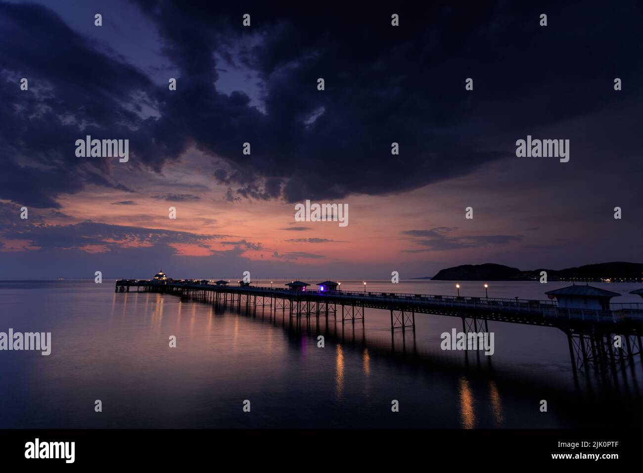 Llandudno pier at sunrise on the north Wales coast Stock Photo