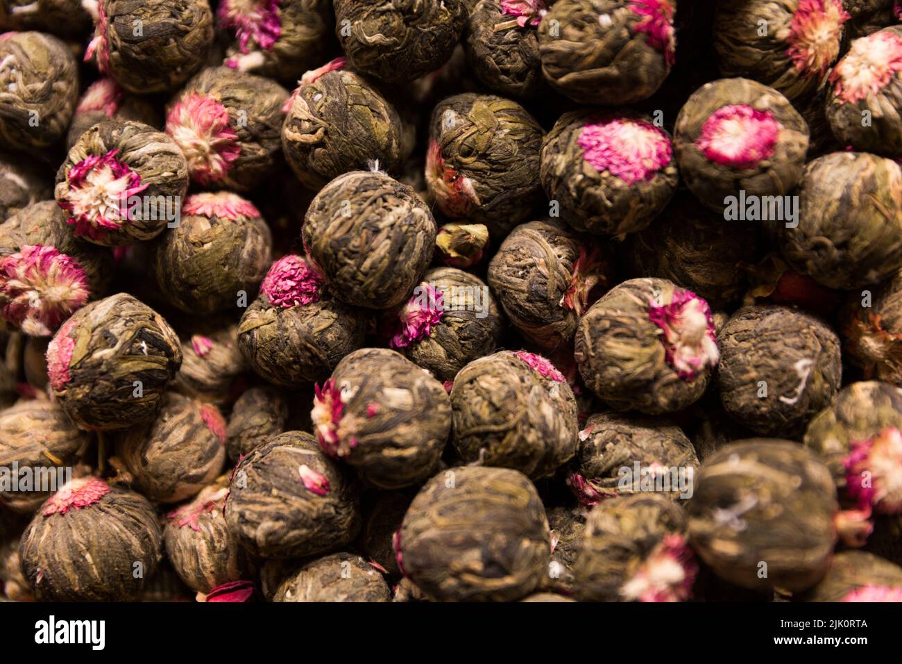 Close shot of blooming jasmine tea balls Stock Photo Alamy