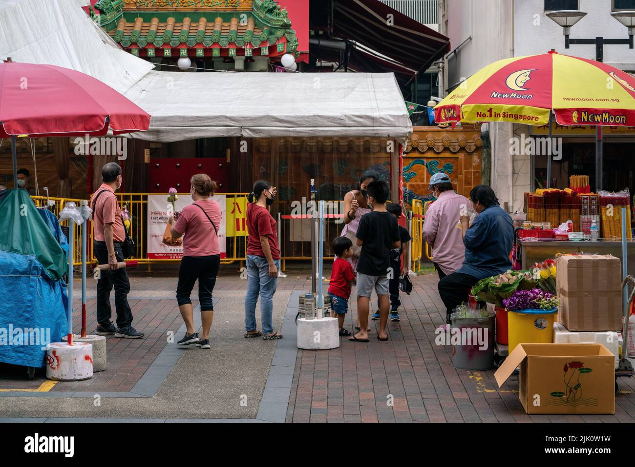 Devotees getting ready with prayer accessories to worship Guan Yin, the