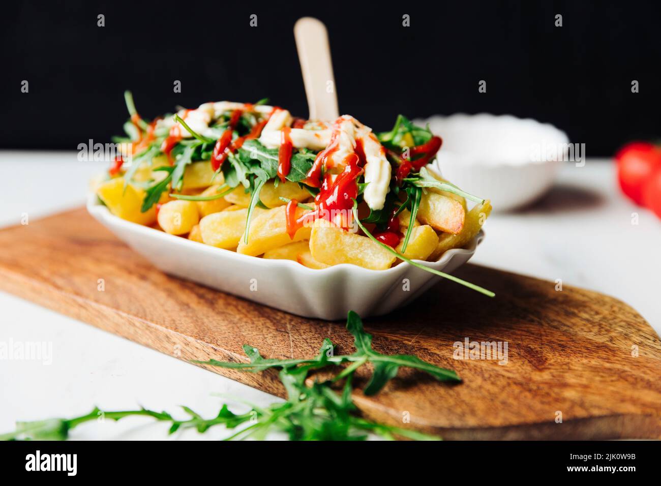 French fries with rocket, ketchup and vegan mayonnaise Stock Photo Alamy