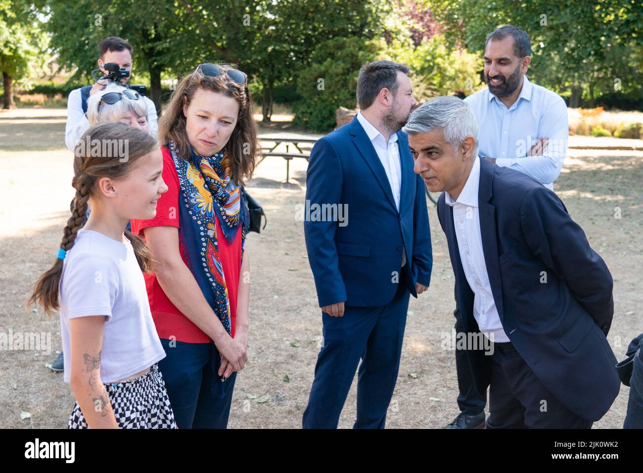 Mayor of London Sadiq Khan (right) meets Redbridge councillor Jo Blackman and her daughter Rosa, 11, during a visit to Mums for Lungs community group in South Woodford, London, to coincide with the final day of the ULEZ expansion consultation and the publishing of new air quality data. Picture date: Friday July 29, 2022. Stock Photo