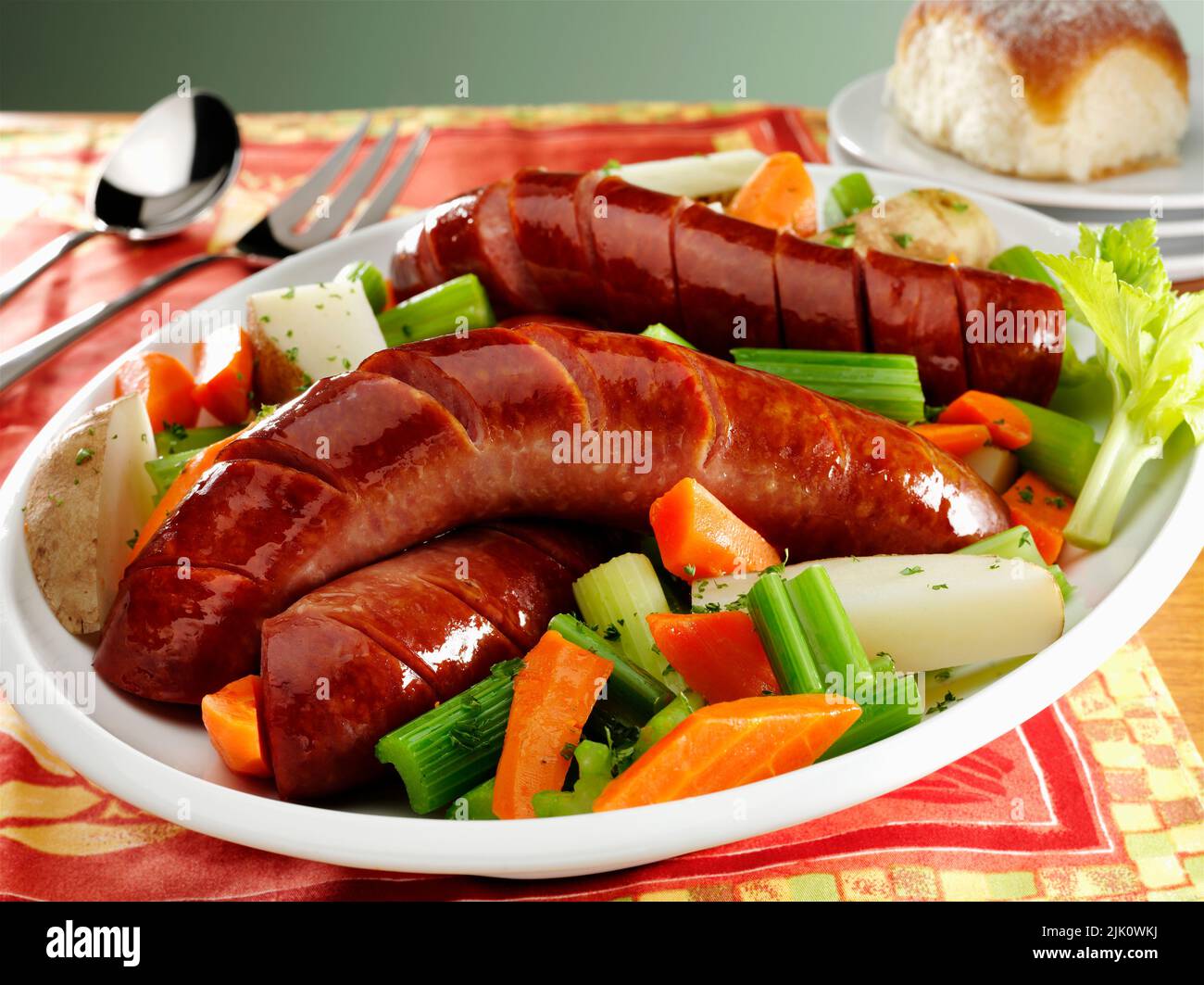 Traditional Polish Kielbasa boiled dinner with carrots, celery and