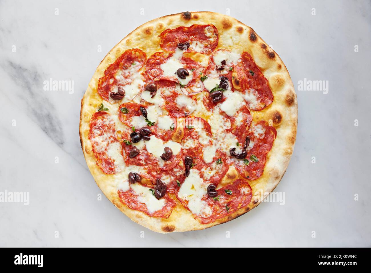 Pepperoni pizza with black olives Stock Photo Alamy