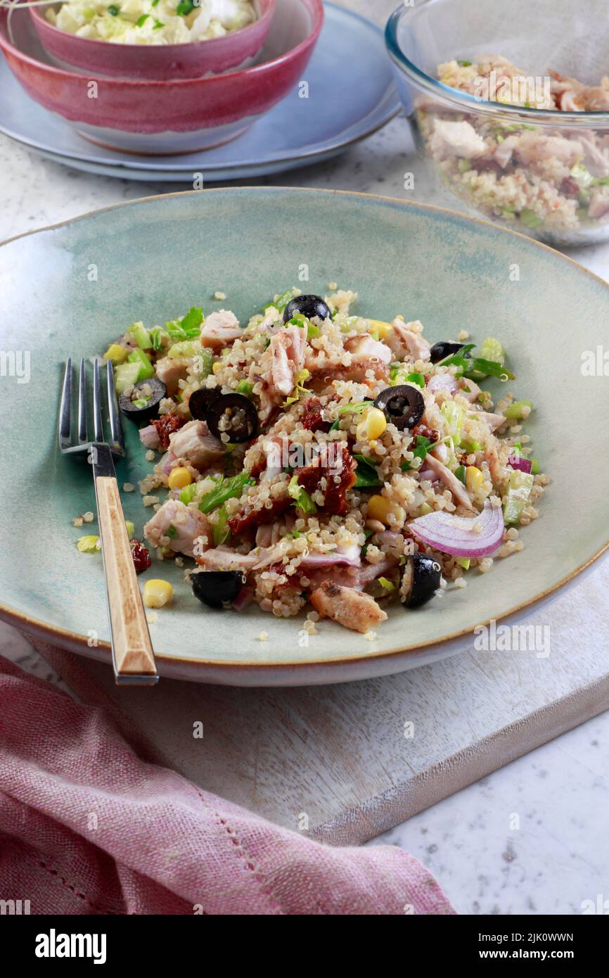 Salad with quinoa, chicken, sun-dried tomatoes and corn Stock Photo