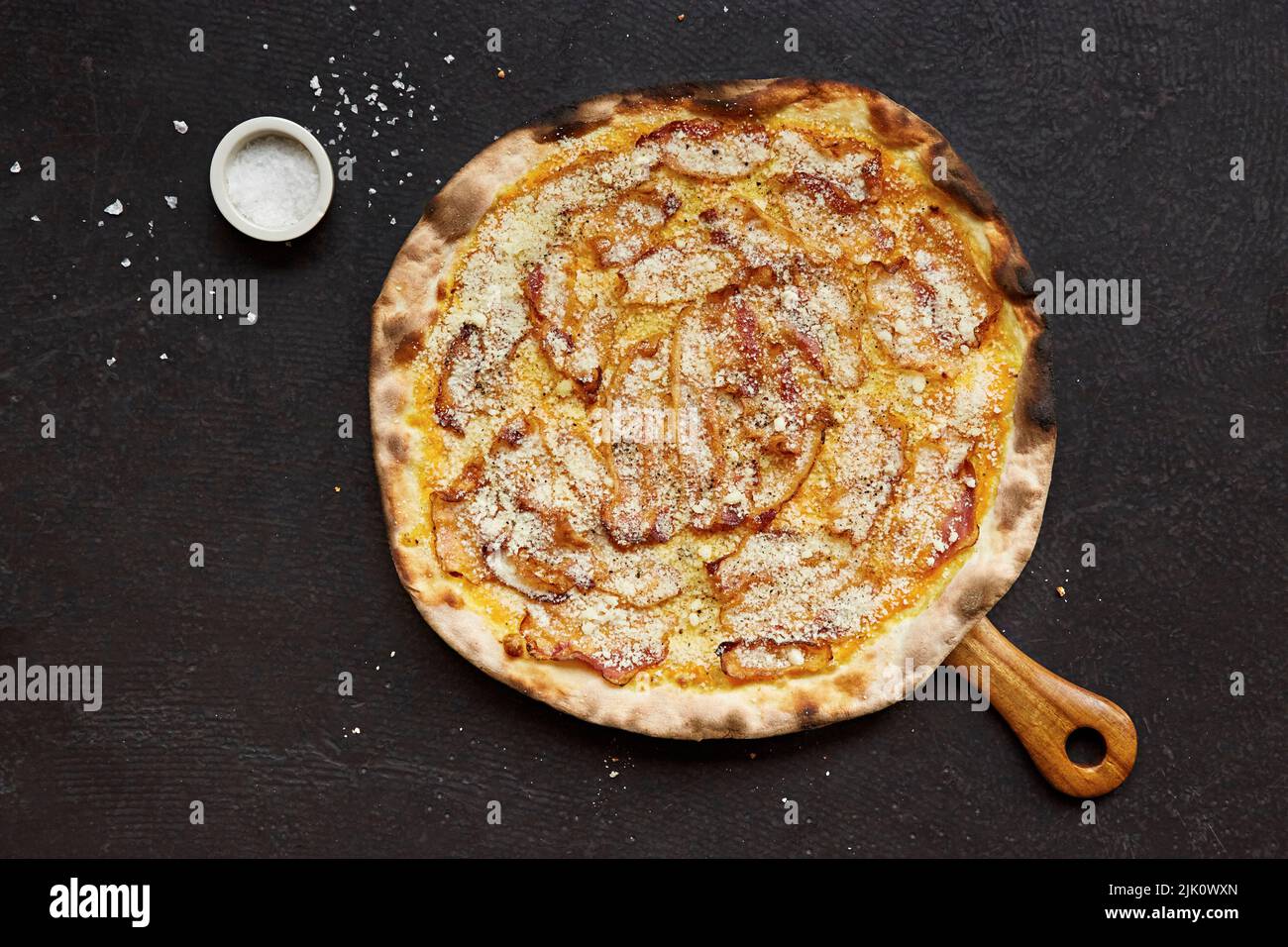 Pancetta pizza with parmesan Stock Photo Alamy