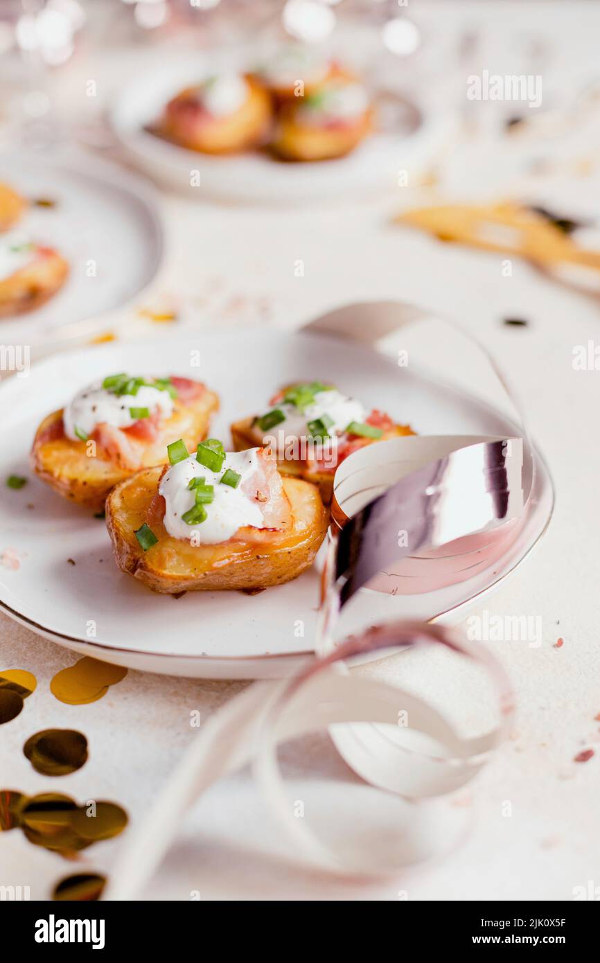 Photo of potatoes with cheese and bacon hi res stock photography and