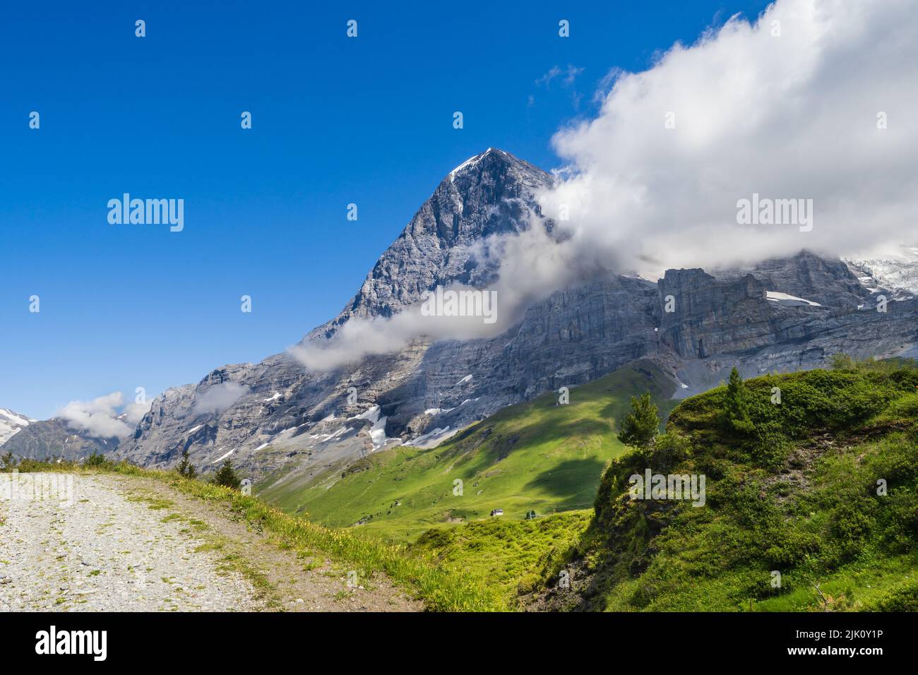 Looking at the Eiger whilst hiling to Wengen from Kleine Scheidegg in the Berneses Oberland of Switzerland Stock Photo