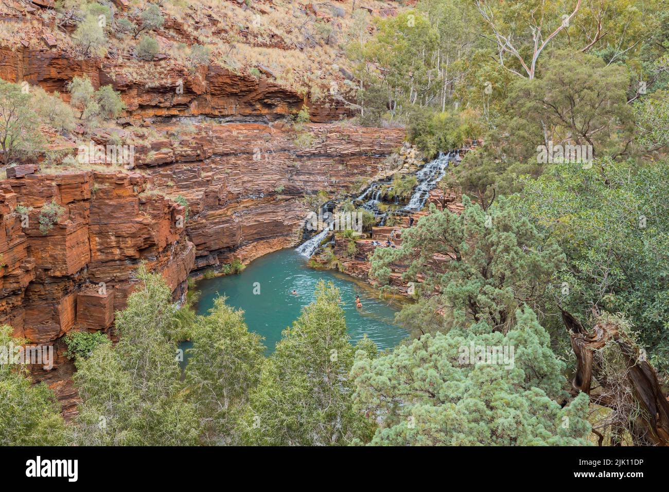 People are enjoying swimming in beautiful Dales Gorge, Karijini National Park, Western Australia Stock Photo