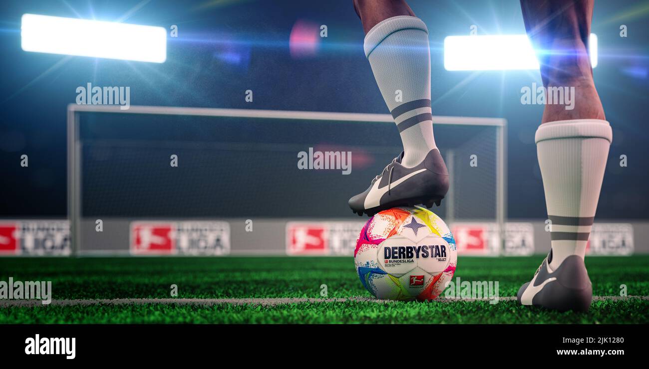 Guilherand-Granges, France - July 29, 2022. Bundesliga of Germany. Soccer player ready for the game with ball and official logo of the Bundesliga. 3D Stock Photo