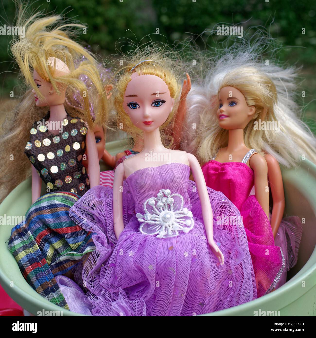 Cute dolls with tousled hairstyles Stock Photo