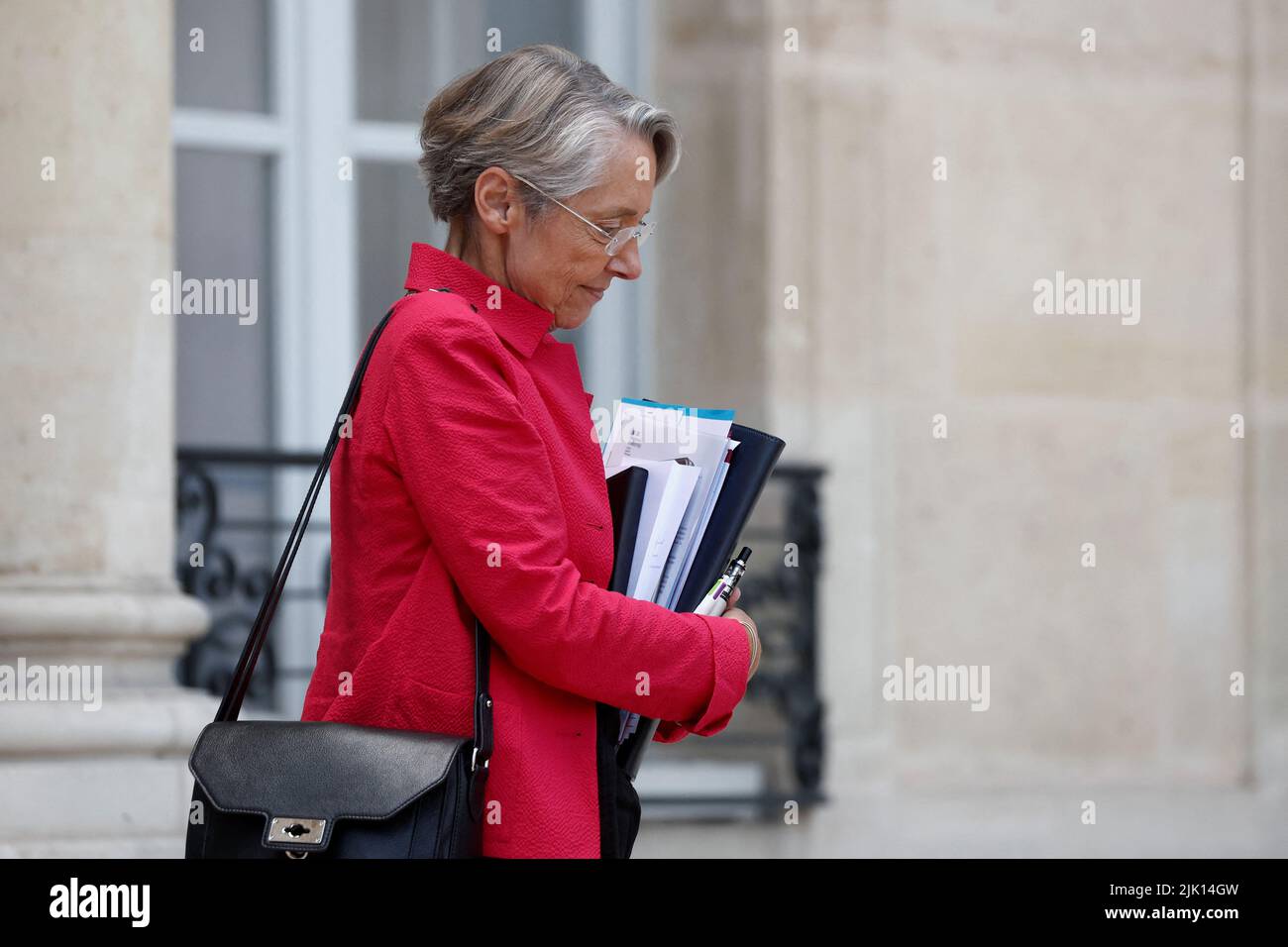 French Prime Minister Elisabeth Borne leaves the Elysee Palace after the weekly cabinet meeting in Paris, France, July 29, 2022. REUTERS/Benoit Tessier Stock Photo