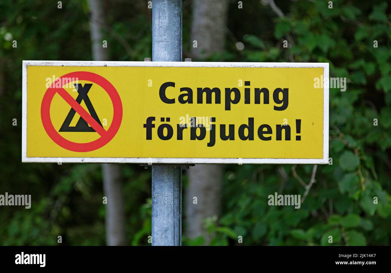 sign with the text camping prohibited Stock Photo Alamy