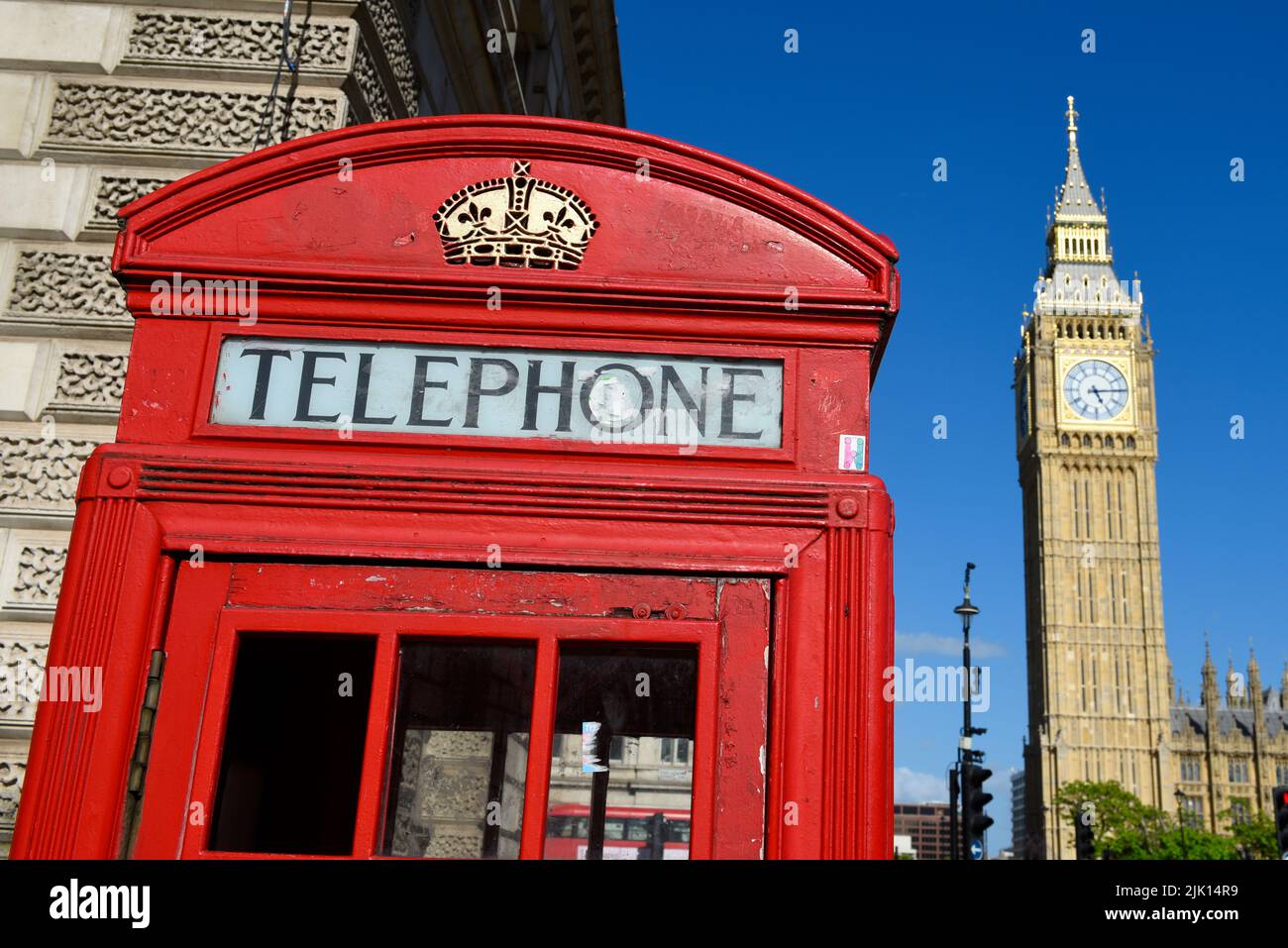 Iconic red telephone box with Big Ben (Elizabeth Tower) in background ...