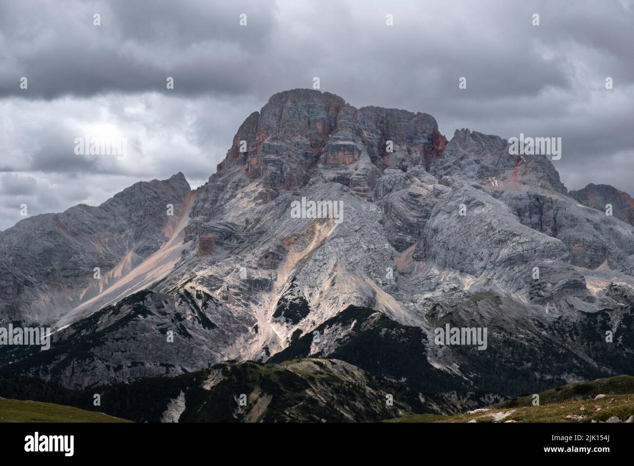 Croda Rossa D'Ampezzo mountain view from the top of Monte Specie with clouds in the sky, Dolomites, Italy, Europe Stock Photo