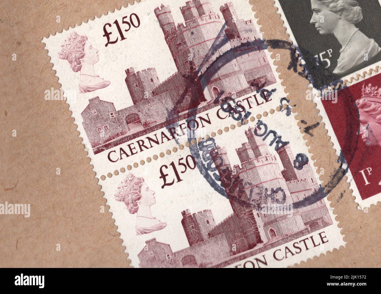 Detail of a brown envelope Great Britain postage stamps. Stock Photo