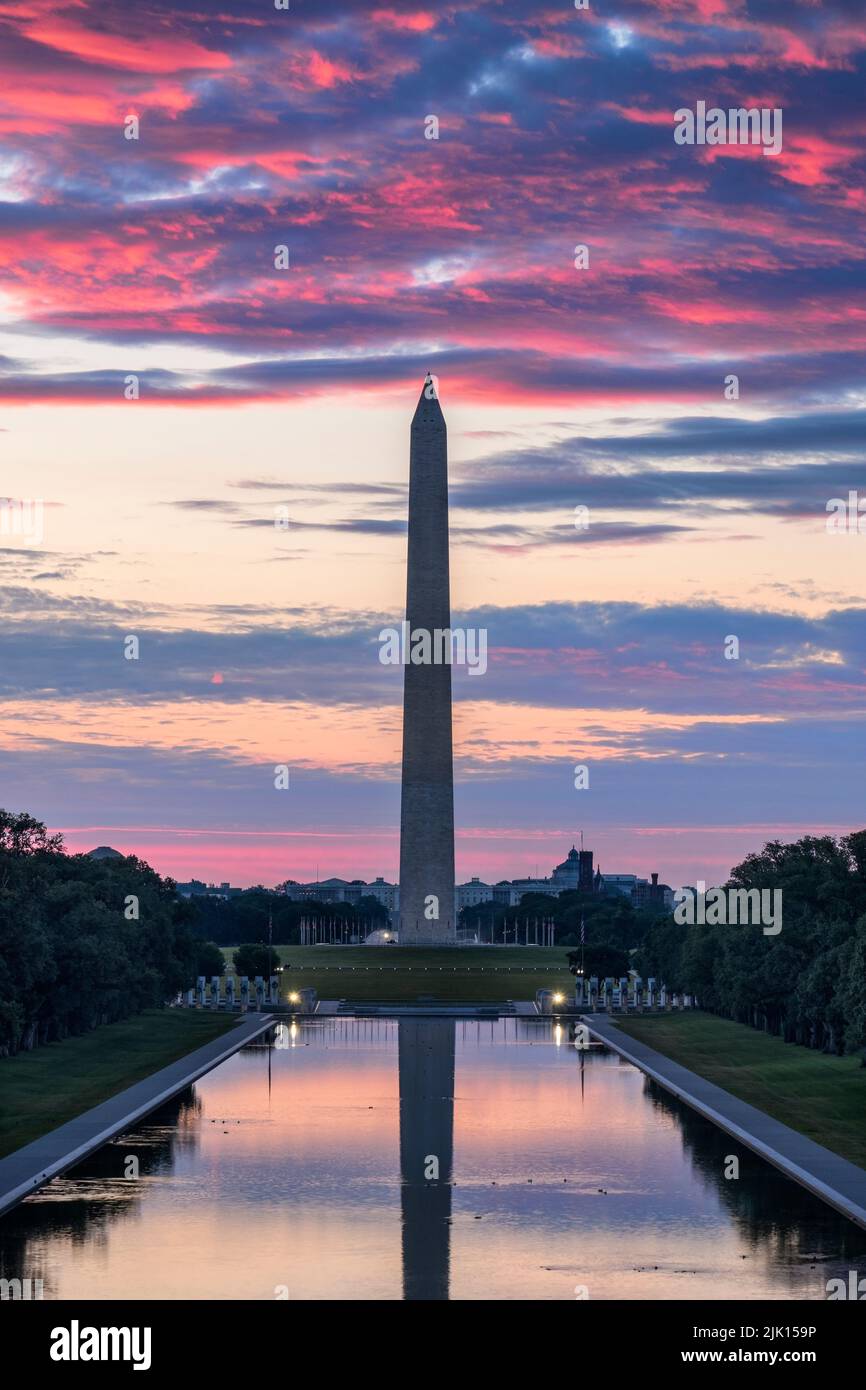The Washington Monument and Reflecting Pool at sunrise, National Mall, Washington DC, United States of America, North America Stock Photo