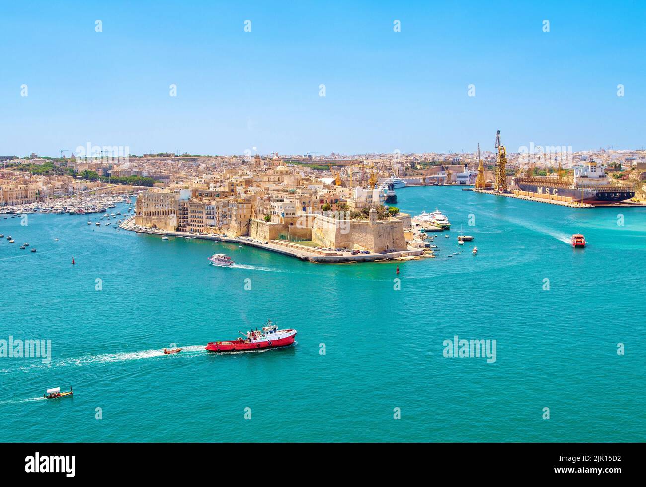 Shipping in valettas ancient grand harbour hires stock photography and