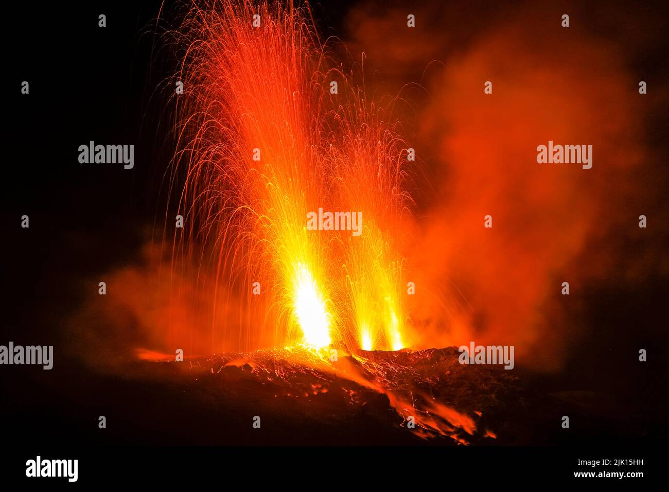 Lava bombs erupt from multiple vents on this volcano, active for at least 2000 years, Stromboli, Aeolian Islands, UNESCO, Sicily, Italy Stock Photo