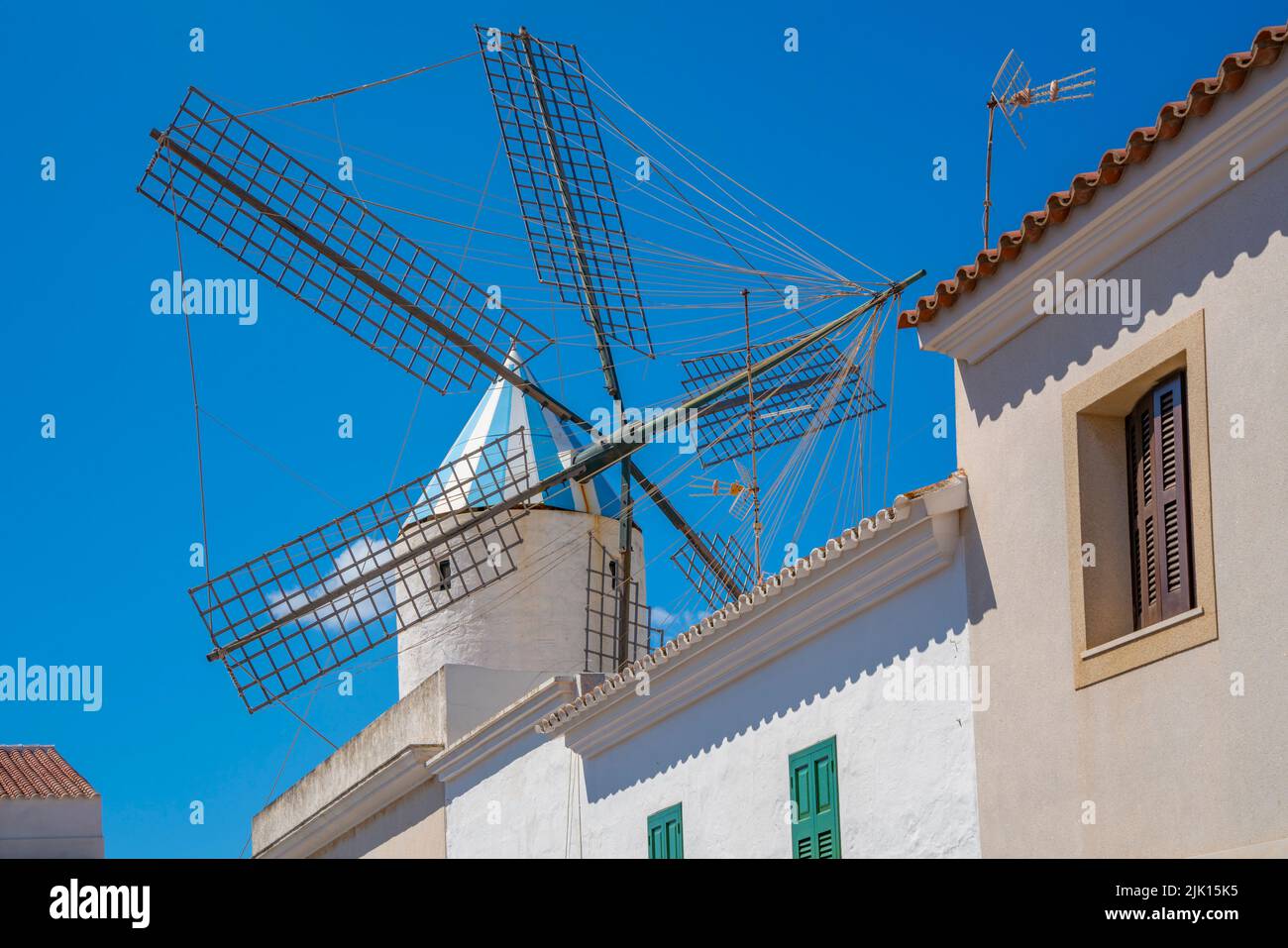 View of whitewashed houses and windmill, Sant Lluis, Menorca, Balearic Islands, Spain, Mediterranean, Europe Stock Photo