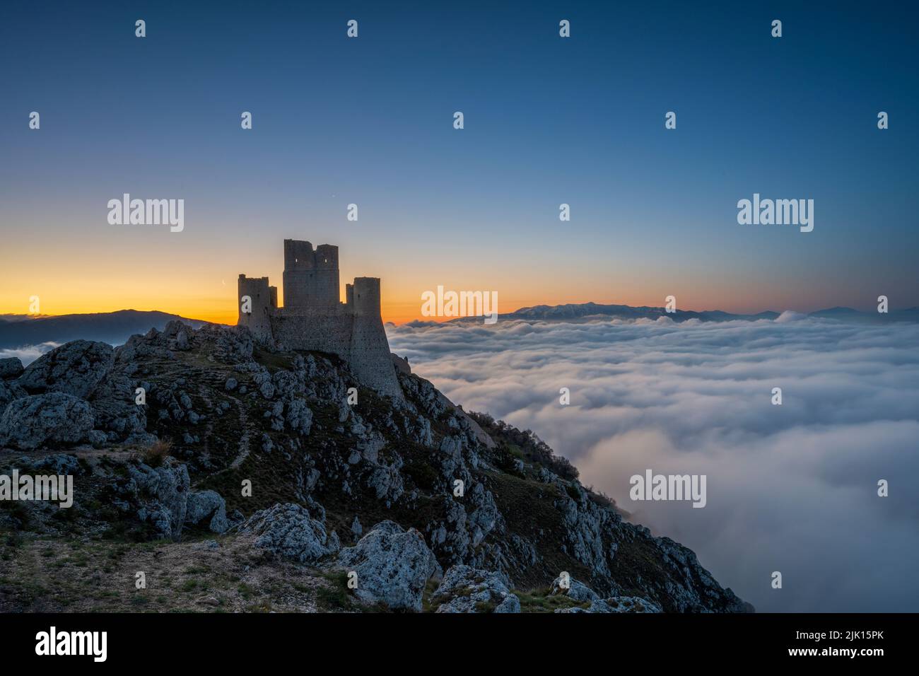 Rocca Calascio at sunrise with cloud inversion, Calascio, L'Aquila, Abruzzo, Italy, Europe Stock Photo