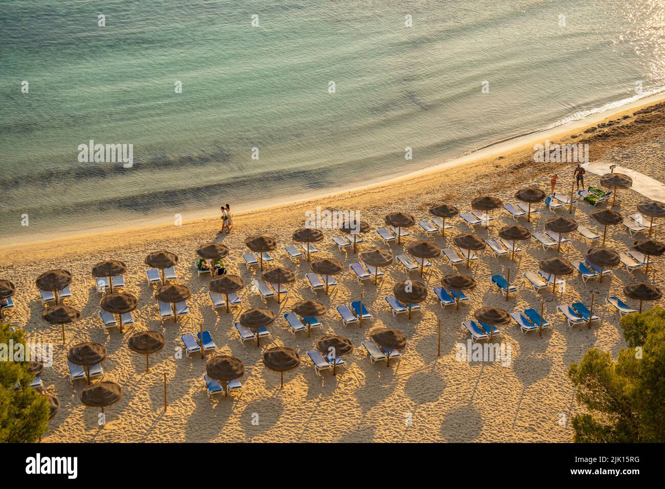 View of sunshades on Platja de Cala Galdana in Cala Galdana, Cala Galdana, Menorca, Balearic Islands, Spain, Mediterranean, Europe Stock Photo
