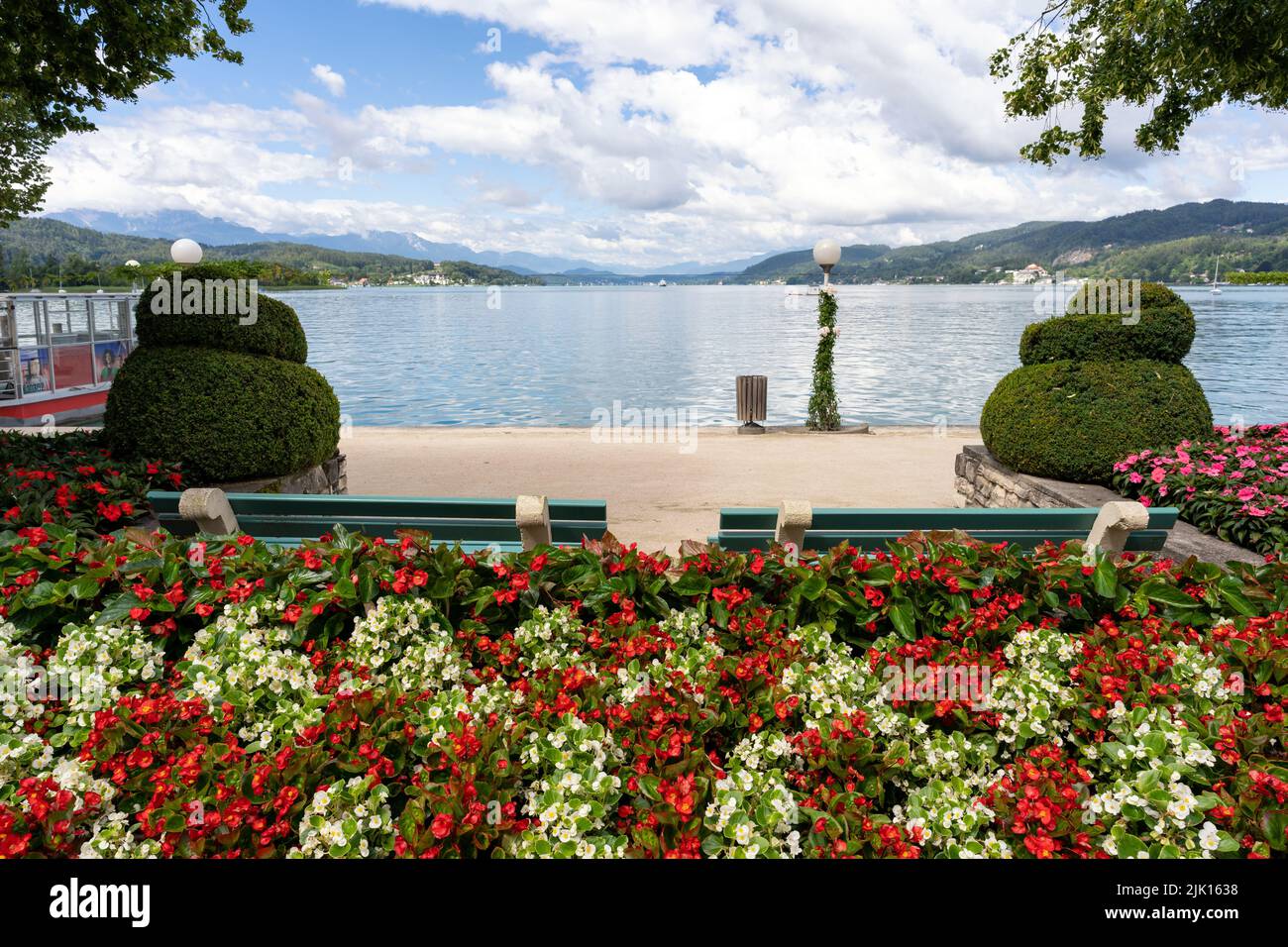 Bench to relax in front of Lake Woerthersee in Carinthia, Austria Stock Photo
