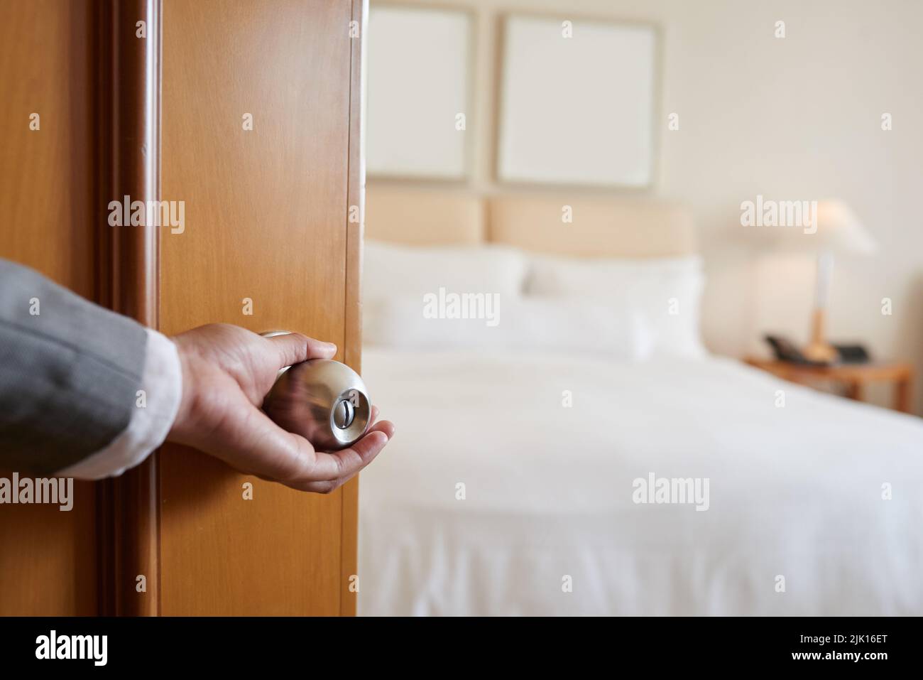 Guest opening door of the hotel room Stock Photo Alamy