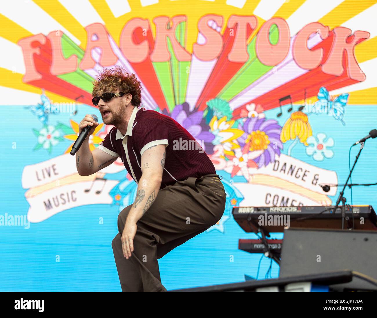 READING, BERKSHIRE, UK. 25 July 2022:  Tom Grennan performs on stage at Flackstock Festival in Reading, Berkshire, England. Credit: S.A.M./Alamy Live News Stock Photo